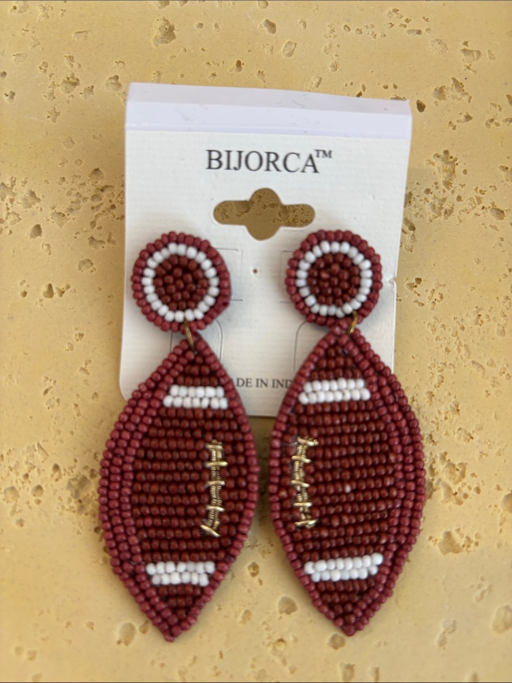 BIJORCA Brown Beaded Football Drop Earrings